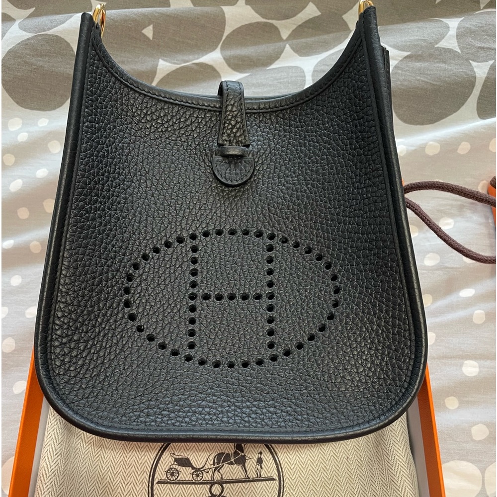 Hermes Evelyne TPM in black and gold hardware
